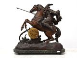 bronze statue of a man on a horse with a spear and a shield