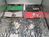 many different types of clothing in a metal container