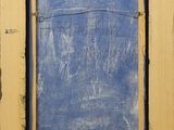 a painting of a blue and yellow frame with writing on it