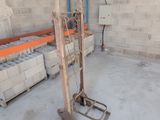 a wooden pallet that is sitting in the middle of a room