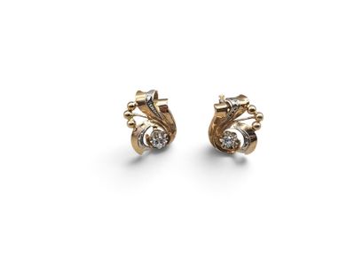 a pair of gold earrings with diamonds on a white background