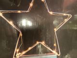 a box with a star shaped decoration on it