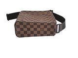 a brown and black checkered fanny bag on a white background