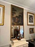 TRUMEAU en bois mouluré et doré, de style Louis XVI, la part…