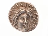 l'image d'une pièce d'argent sur laquelle figure le visage d'une femme