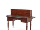 an image of a desk with a drawer on top of it