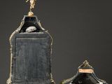 an antique clock with a statue of an angel on top of it