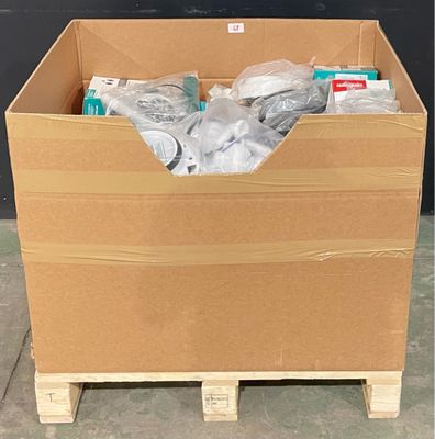 a cardboard box with a bunch of items inside of it