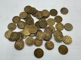 a lot of coins that are on the table