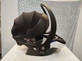 a baby stroller that is sitting on a table