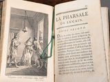 an open book with a picture of a man and a woman on it