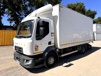 a white truck that is parked in a lot