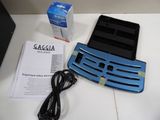 an image of a blue and black cell phone next to a box of cigarettes