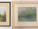 deux tableaux encadrés représentant des arbres et des buissons sur un mur blanc