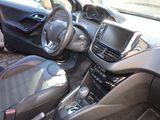 the interior of a car with a steering wheel and dashboard