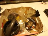 a box with various items in it on a table
