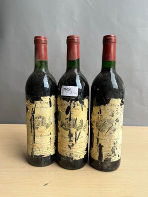 three bottles of wine sitting on top of a table next to each other