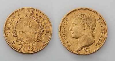 two gold sovereigns, one of which has a bust and the other of which is a bust