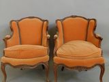 pair of antique french style chairs with orange velvet upholstered seats