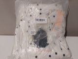 a plastic bag with a stuffed animal inside of it