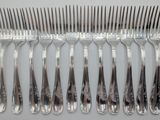six forks and a comb on the table