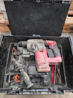 a tool box with tools inside of it on the floor