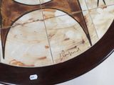 a picture of a table with a picture of a horse on it