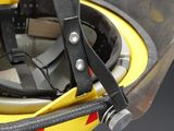 a close up of a helmet with a strap attached to it
