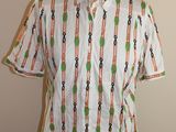 une image représentant une chemise blanche à motifs