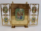 a gold picture frame with pictures on it on a white background