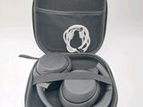 a black case that has a pair of headphones in it