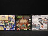 three board games that are on display on the table