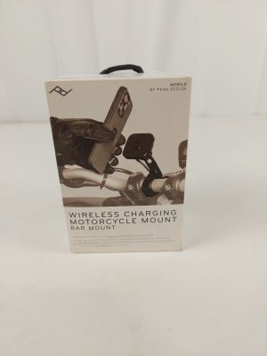 the box of a wireless charging device is open on a white surface