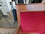 a red chair that is sitting in a room