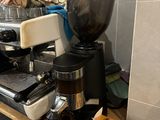 a coffee maker sitting on top of a kitchen counter
