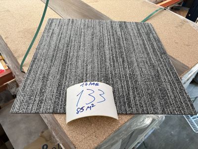 a picture of a piece of carpet with a price tag on it