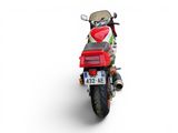 a red motorcycle parked on the side of the road