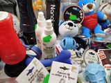 a bowl full of toys and other items on a table