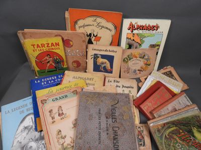 many children ' s books that are on a table