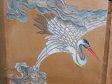 a painting of a crane flying in the sky