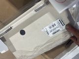 a person that is holding a box with something inside of it