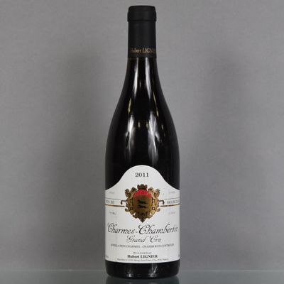 a bottle of wine that is sitting on a table