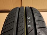 a close up of a tire with a yellow line on it