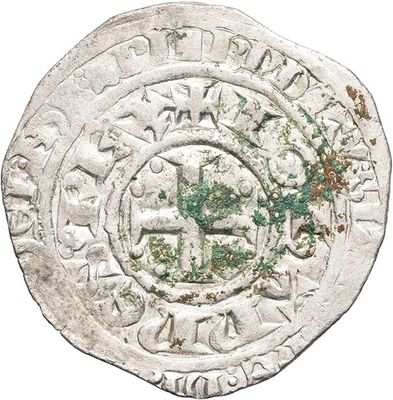 a close up of a coin with a tree on it
