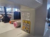 a sewing machine that is sitting on a table