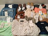 a lot of clothes and shoes on a shelf