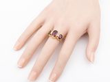 an image of a woman ' s hand with a ring on it ' s finger