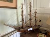 a model of a ship on a table in a room