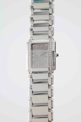 an image of a woman ' s wrist watch on a white background