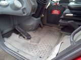a picture of the inside of a car with the door open